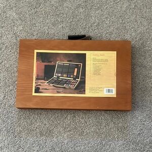 Art set includes oil pastels, watercolors, brushes, colored pencils and more